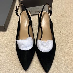 Black suede pointed toe heels